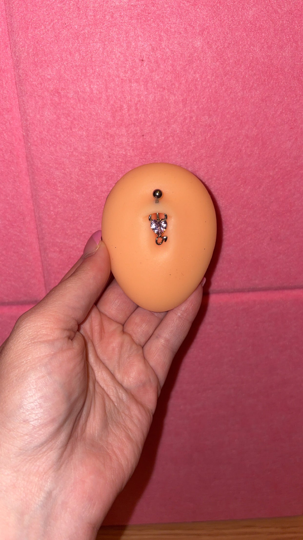 Pink devil belly ring