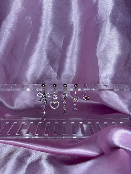 Pink and silver belly rings