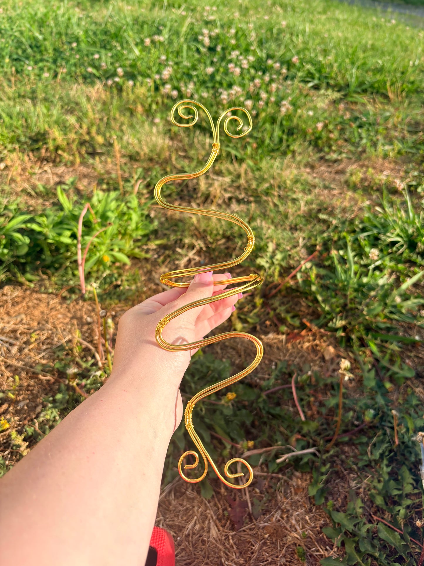 Swirly arm cuff